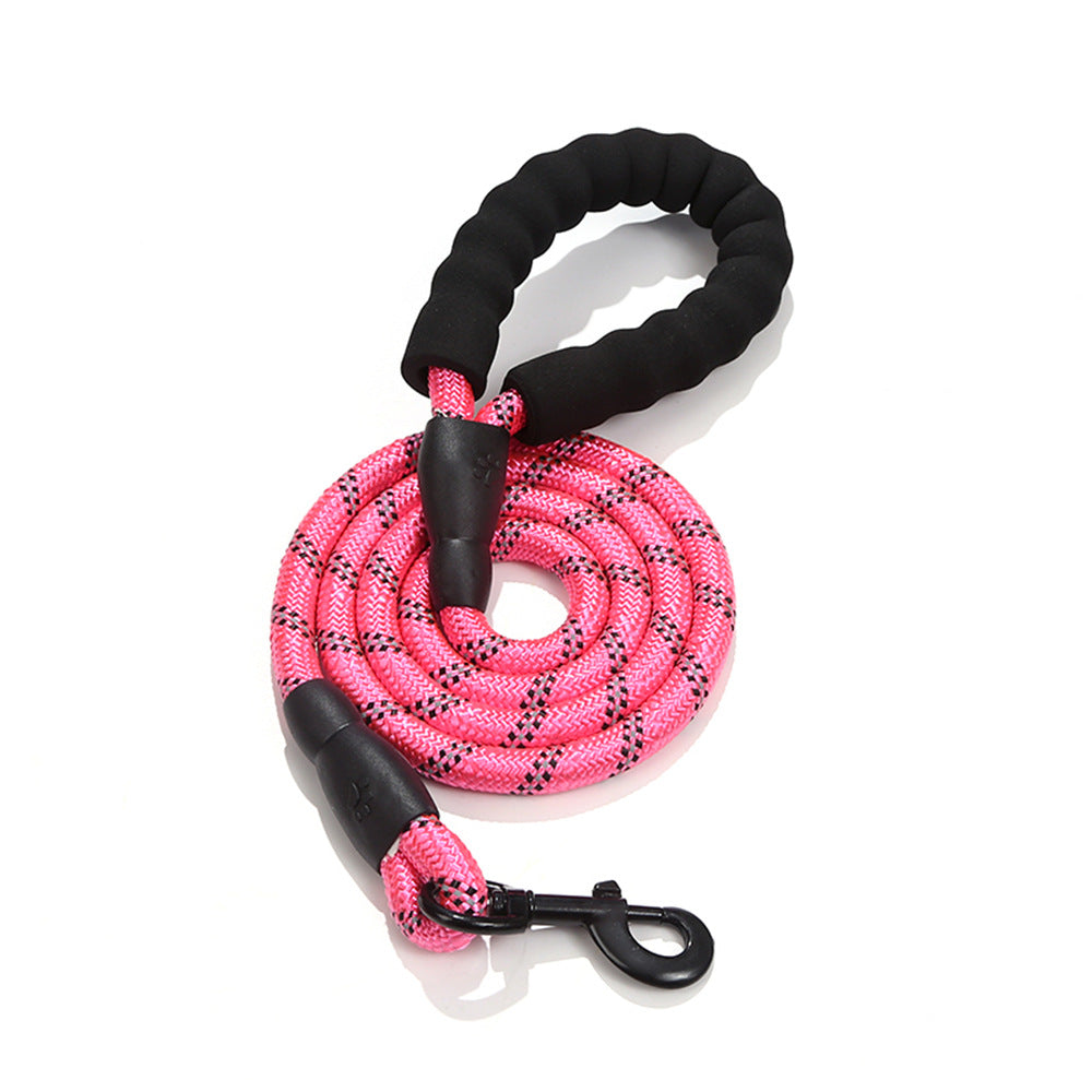 Pink dog leash with black handles on a white background