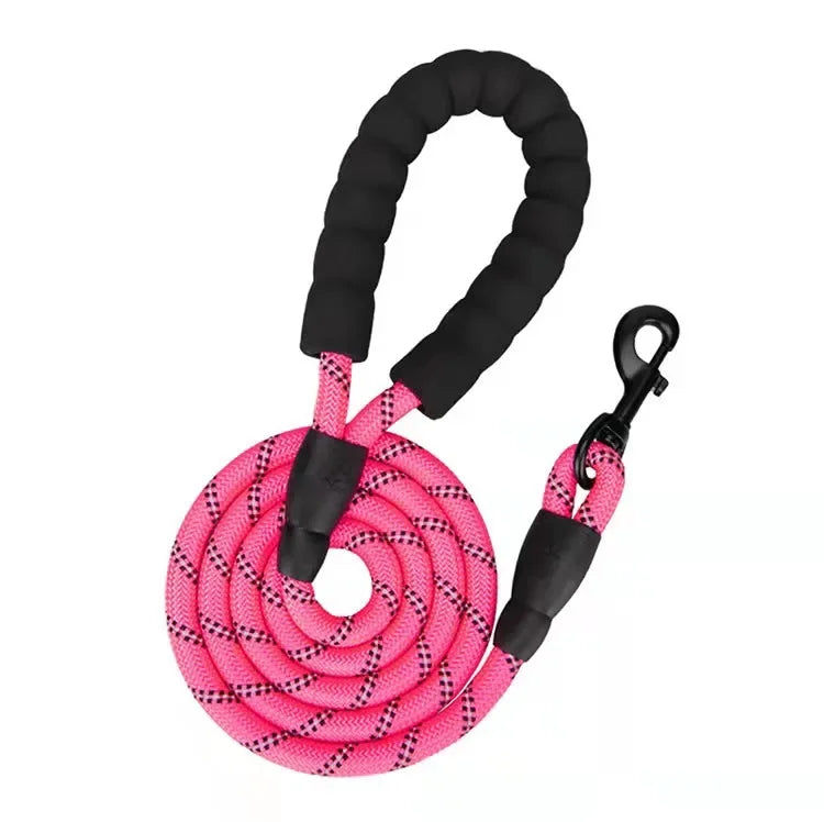 Pink dog leash with black handles on a white background
