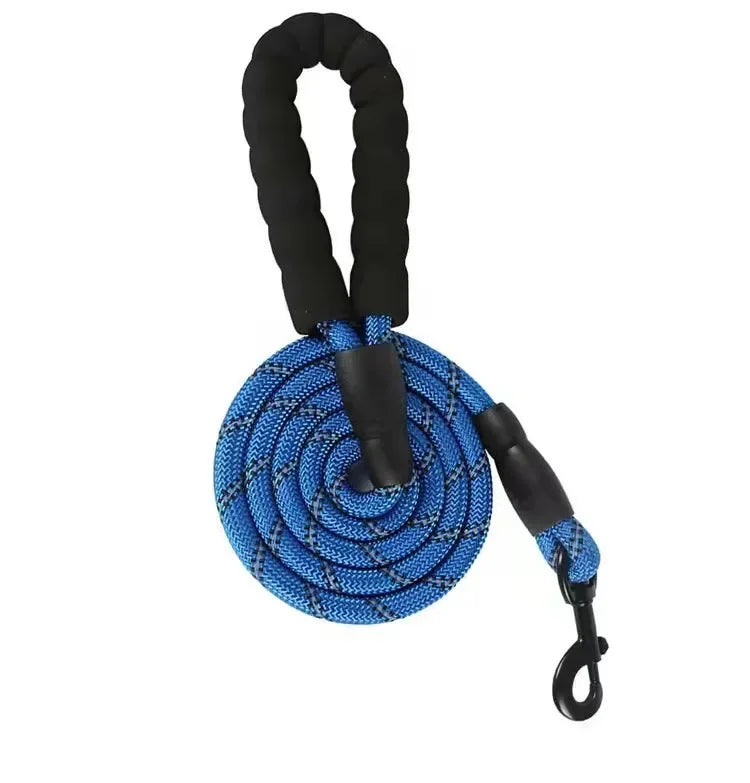 Blue dog leash with black handle on a white background